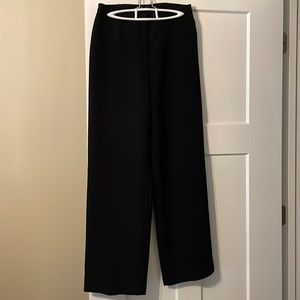 Woman’s black slacks